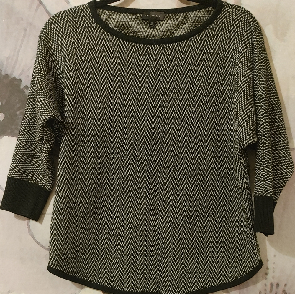 The limited black and white sweater